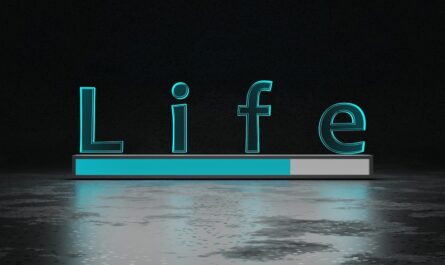 a lit up sign sitting on top of a floor