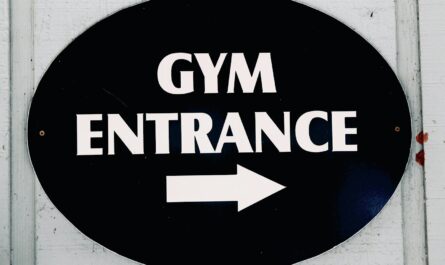 The sign points to the gym entrance.