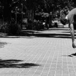 a man is doing a trick on a skateboard