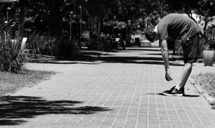 a man is doing a trick on a skateboard