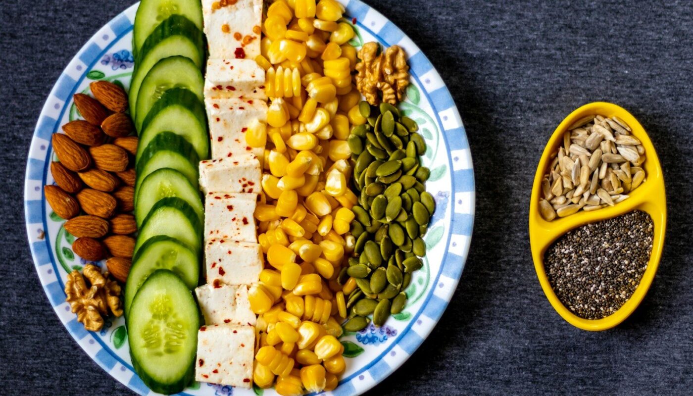 sliced cucumber on white and blue ceramic plate